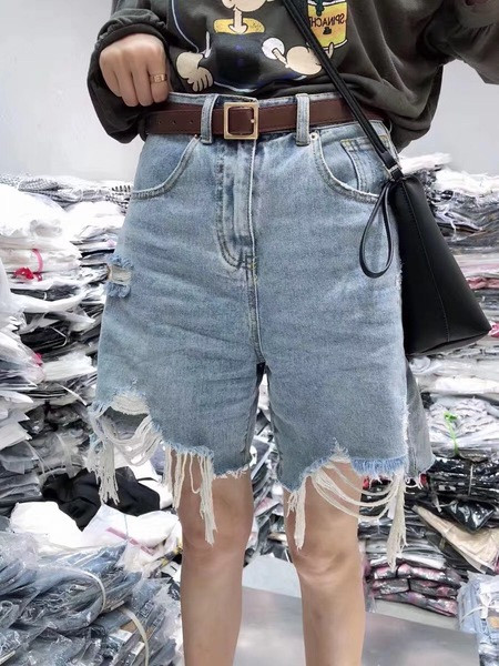 Rebenenud kummi ja taskutega vabaaja naiste lühikesed teksad