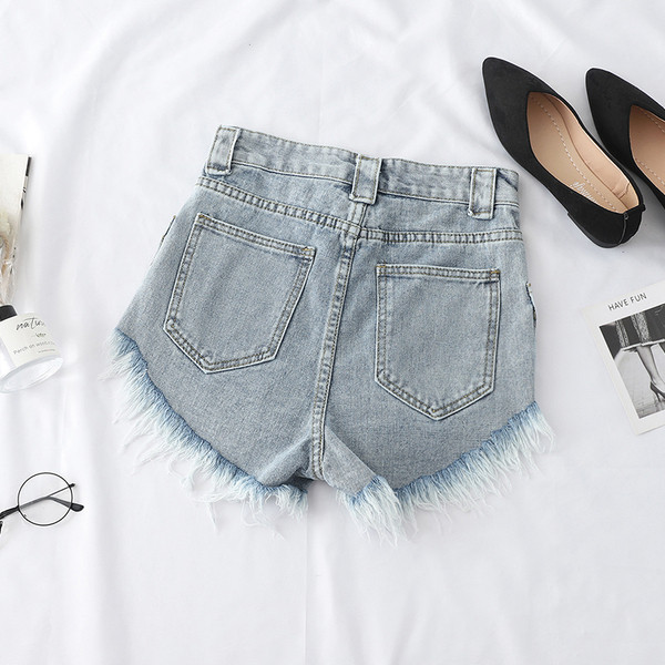 Naiste rebenenud motiividega teksapüksid