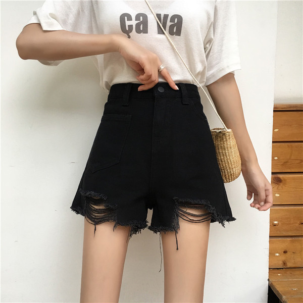 Kahes värvitoonis vabaaja naiste kõrge vöökoha ja rebenenud mustriga lühikesed teksad