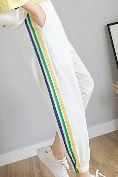 Alkalmi női hosszú nadrág gumírozott derékkal és szegéllyel