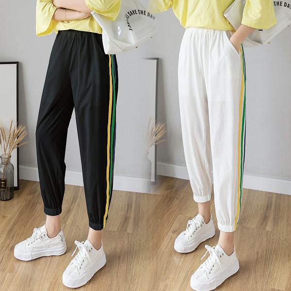 Alkalmi női hosszú nadrág gumírozott derékkal és szegéllyel