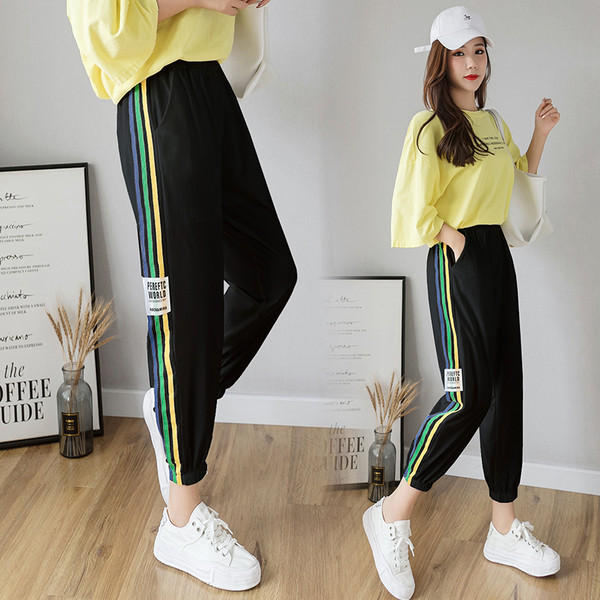 Alkalmi női hosszú nadrág gumírozott derékkal és szegéllyel