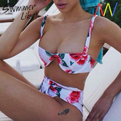 Costum de baie dama cu model floral si top taiat puternic