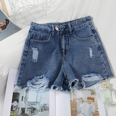 Pantaloni scurți de damă din denim cu motive rupte