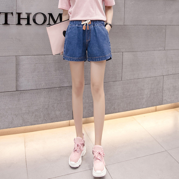 Naiste vabaaja lühikesed püksid elastse vöökoha ja taskutega