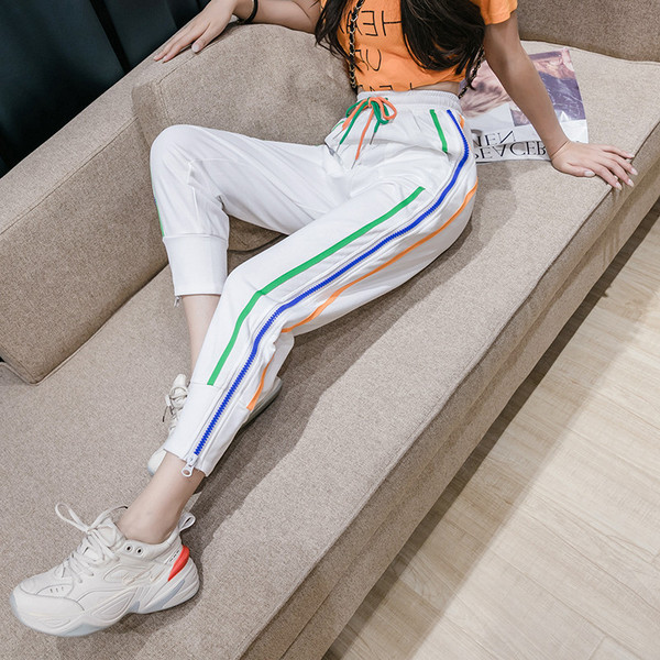 Vabaaja naiste spordipüksid luku ja ääristega