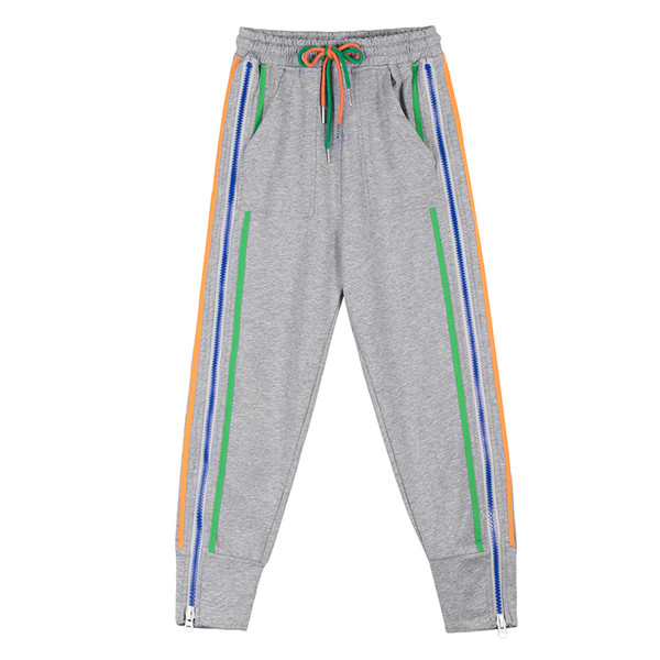 Vabaaja naiste spordipüksid luku ja ääristega