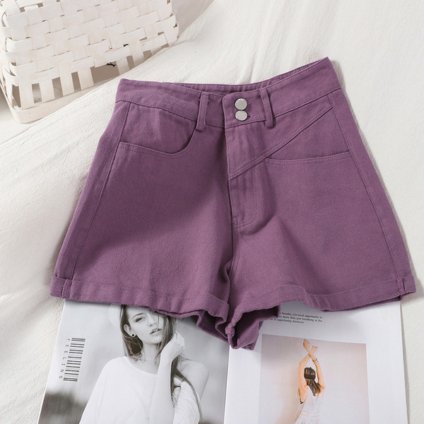 Naiste lühikesed püksid taskute ja kõrge vöökohaga