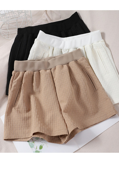 Naiste lühikesed püksid elastsete ja taskutega