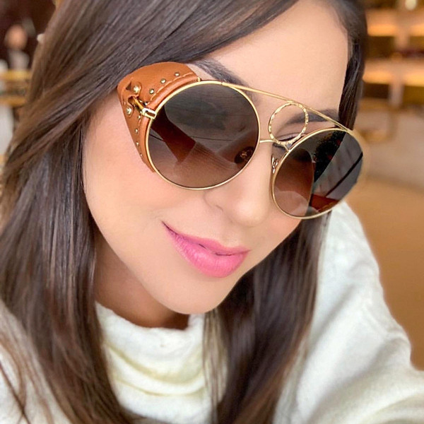 Elegantsed ümara kujuga ja õhukese raamiga naiste päikeseprillid