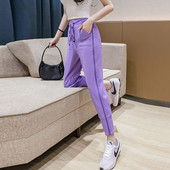 Moodsad naiste spordipüksid luku ja paeltega