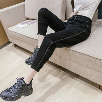 Модерни дамски спортни панталони с цип и връзки 