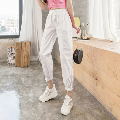 Naiste vabaaja pikad püksid elastse vöökoha ja lipsudega