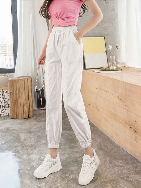 Naiste vabaaja pikad püksid elastse vöökoha ja lipsudega