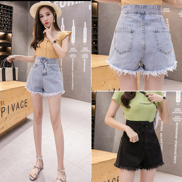 Női rövid farmer új modellje szakadt jobb oldali gombbal és magas derékkal