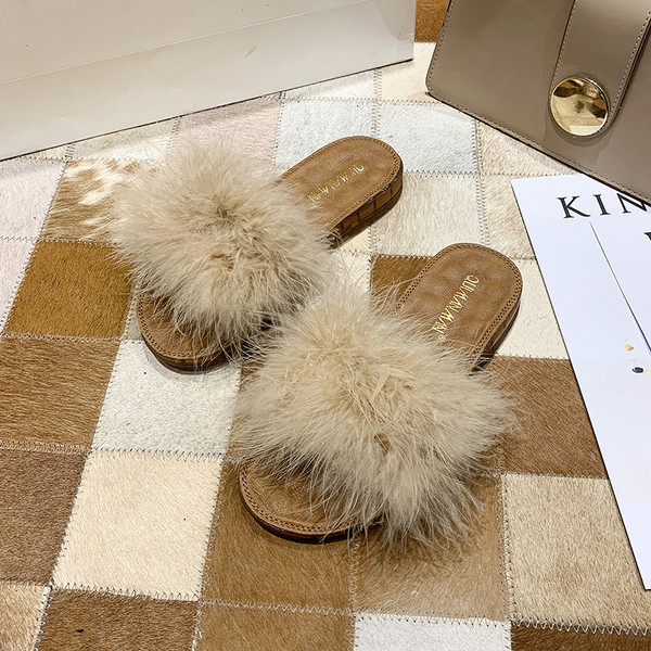 Elegantsed õhukese talla ja udusulgedega naiste sussid