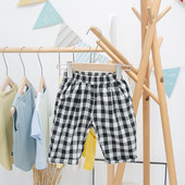 Pantaloni copii in carouri cu buzunare pentru baieti