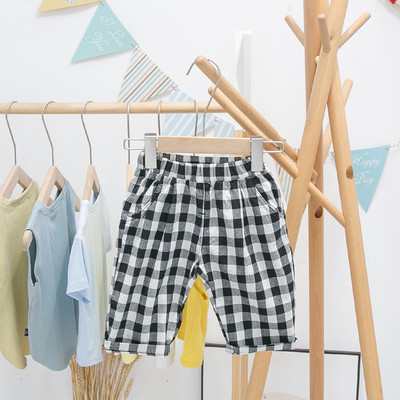 Pantaloni copii in carouri cu buzunare pentru baieti