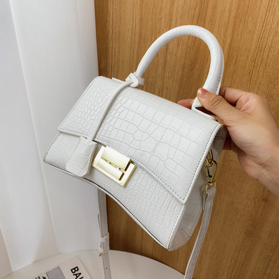 Moodne ökonahast pikkade ja lühikeste sangadega ning metallist kinnitusega naiste kott