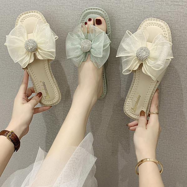 Naiste vabaaja sussid paela ja kivikestega