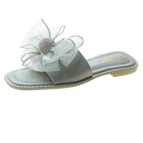 Naiste vabaaja sussid paela ja kivikestega