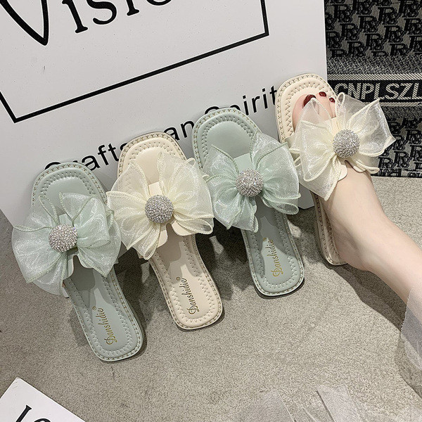 Naiste vabaaja sussid paela ja kivikestega