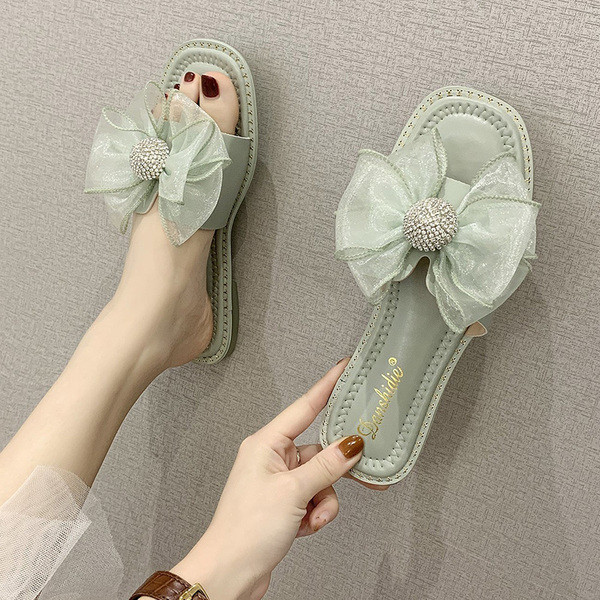 Naiste vabaaja sussid paela ja kivikestega