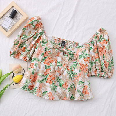 Bluza de dama model nou cu decolteu oval, cravate si model floral