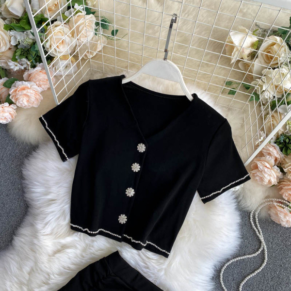 Черен дамски комплект от две части - къса жилетка и пола с висока талия