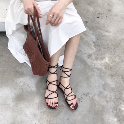 Дамски летни сандали с равна подметка и кожени връзки