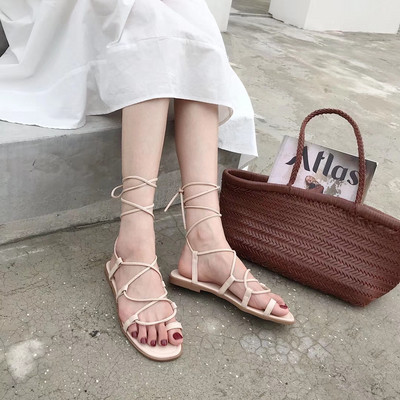 Дамски летни сандали с равна подметка и кожени връзки