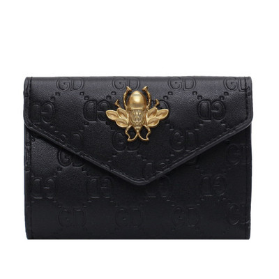 Дамско ежедневно портмоне с метален елемент от еко кожа