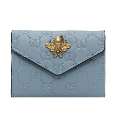 Ženska svakodnevna torbica sa metalnim elementom od eko kože