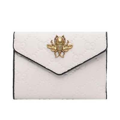 Ženska svakodnevna torbica sa metalnim elementom od eko kože