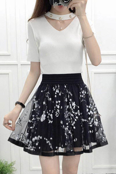 Разкроена дамска пола с висока талия и флорална бродерия