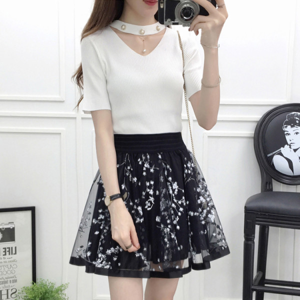 Разкроена дамска пола с висока талия и флорална бродерия