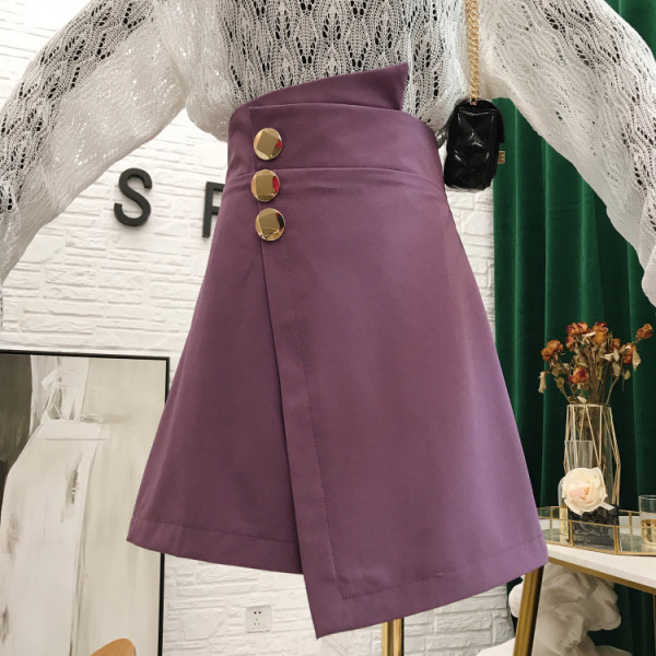 Асиметрична дамска пола с висока талия и метални елементи 