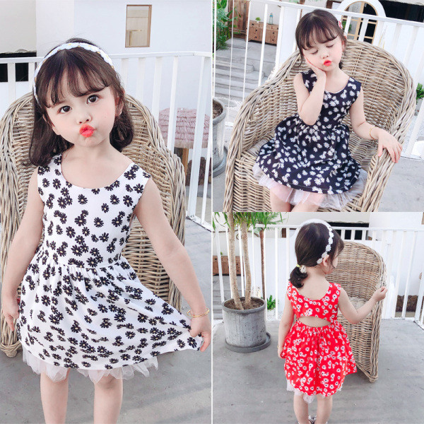 Актуална детска рокля с флорални мотиви и овално деколте