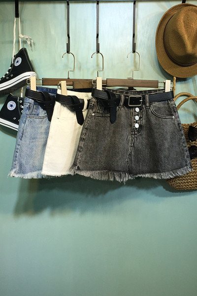 Дамска дънкова пола с копчета и висока талия 