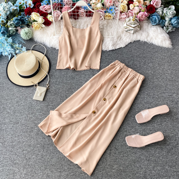 Дамски комплект включващ потник и пола с копчета