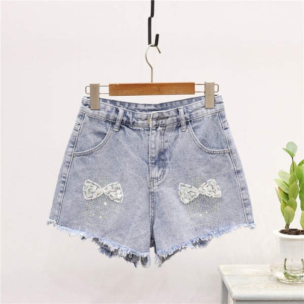 Ежедневен дамски комплект от две части - тениска и къси дънкови панталони