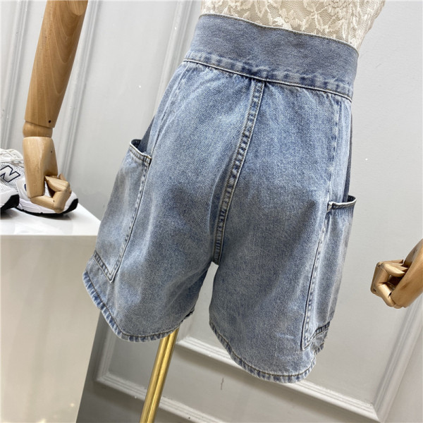 Pantaloni scurți de damă la modă, cu talie înaltă și buzunare laterale