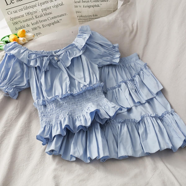 Ikdienas sieviešu komplekts ar svārkiem ar augstu jostasvietu un blūzi ar īsām piedurknēm