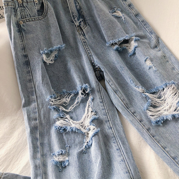 Kõrge vöökoha ja rebenenud motiividega vabaaja naiste teksapükste lai mudel