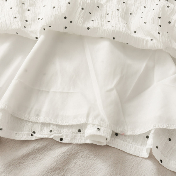 Sieviešu balta punktveida kleita ar lentīti