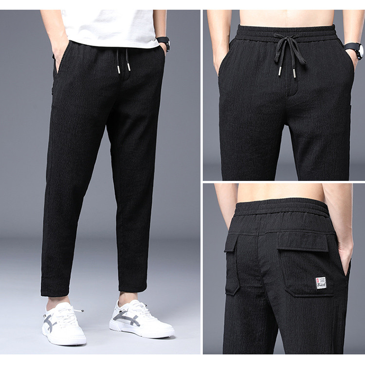 Pantaloni casual barbatesti din material subtire cu talie elastica si buzunare