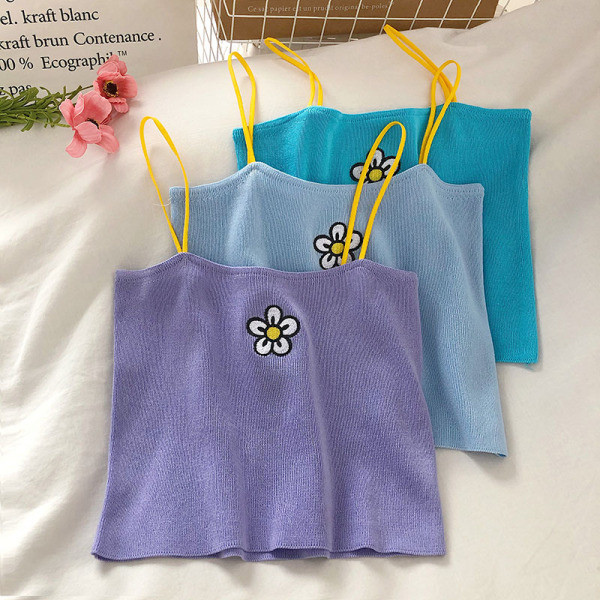 Tikandite ja õhukeste rihmadega igapäevane naiste topp