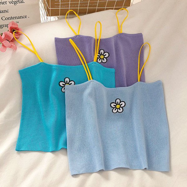 Tikandite ja õhukeste rihmadega igapäevane naiste topp