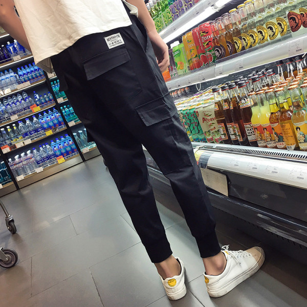 Vīriešu sporta un ikdienas bikses ar kabatām un izmēriem līdz 5XL