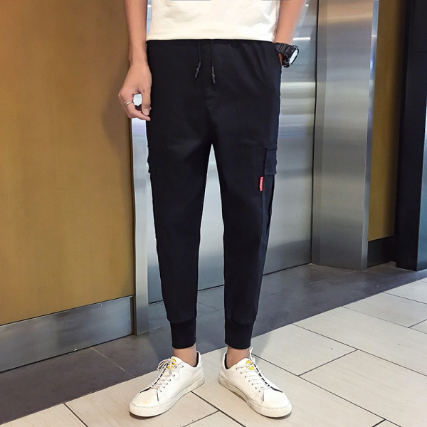 Vīriešu sporta un ikdienas bikses ar kabatām un izmēriem līdz 5XL